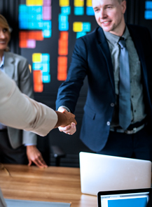 business people shaking hands meeting room2